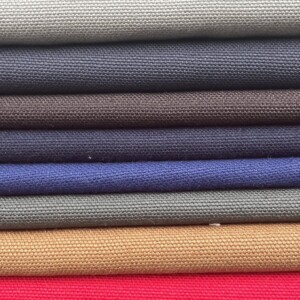 Canvas fabric is rugged, sturdy, and versatile, ideal for durable bags, tents, and sturdy workwear.